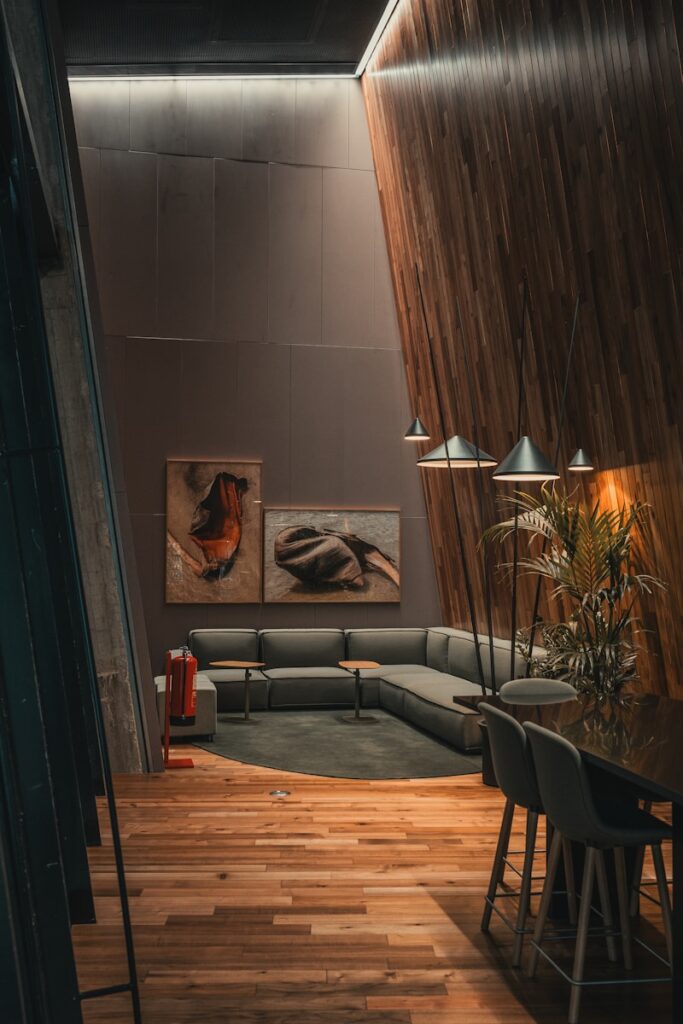 A living room filled with furniture and a wooden floor